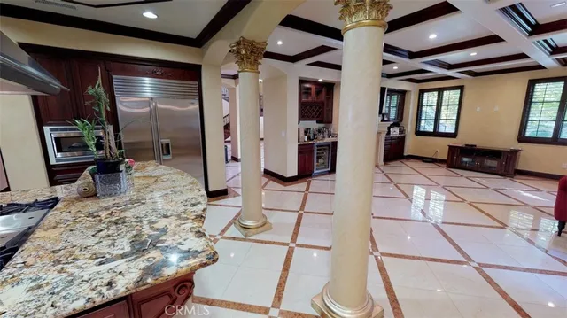 a view of a lobby with furniture and floor to ceiling window