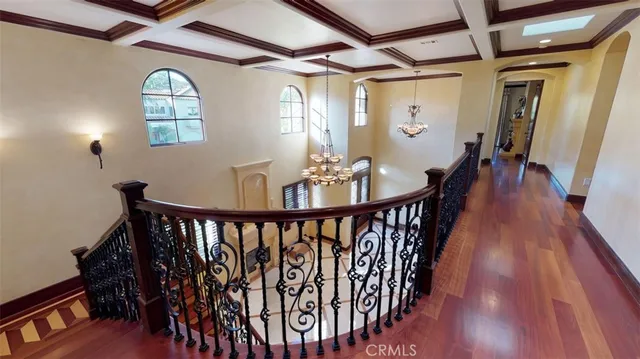 a view of entryway with wooden floor