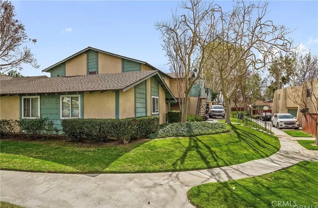 1375 Wheaton Way Riverside, CA 92507 - Photo 3 of 15 a front view of a house with a yard