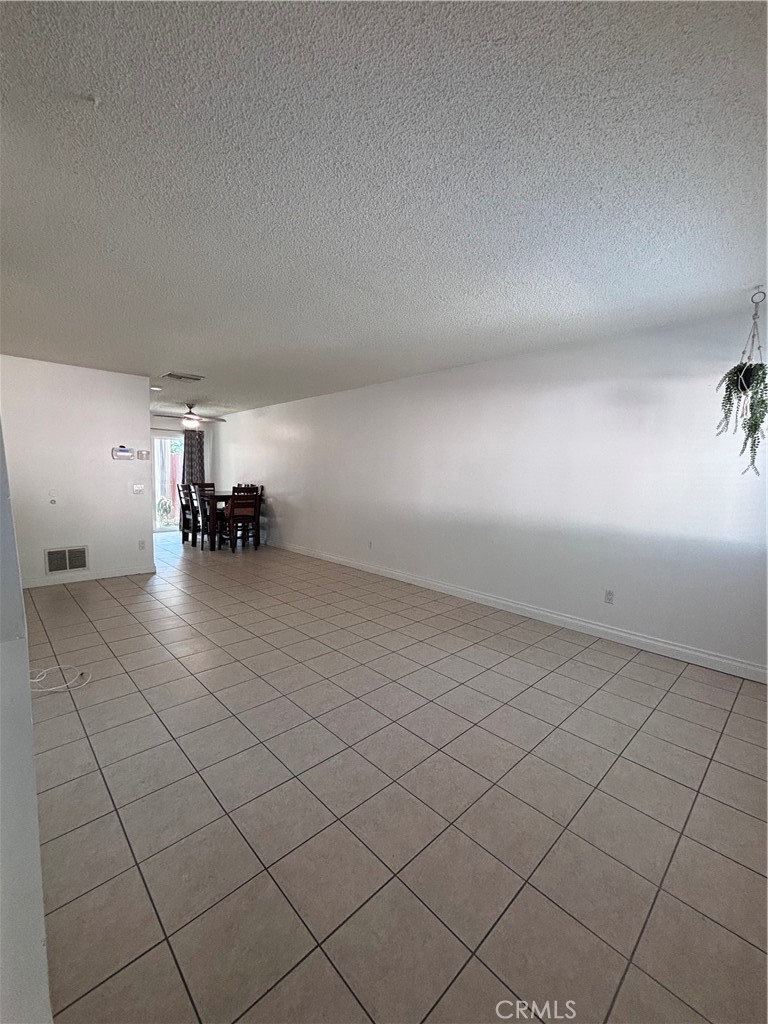 1375 Wheaton Way Riverside, CA 92507 - Photo 7 of 15 an empty room and entrance to other room