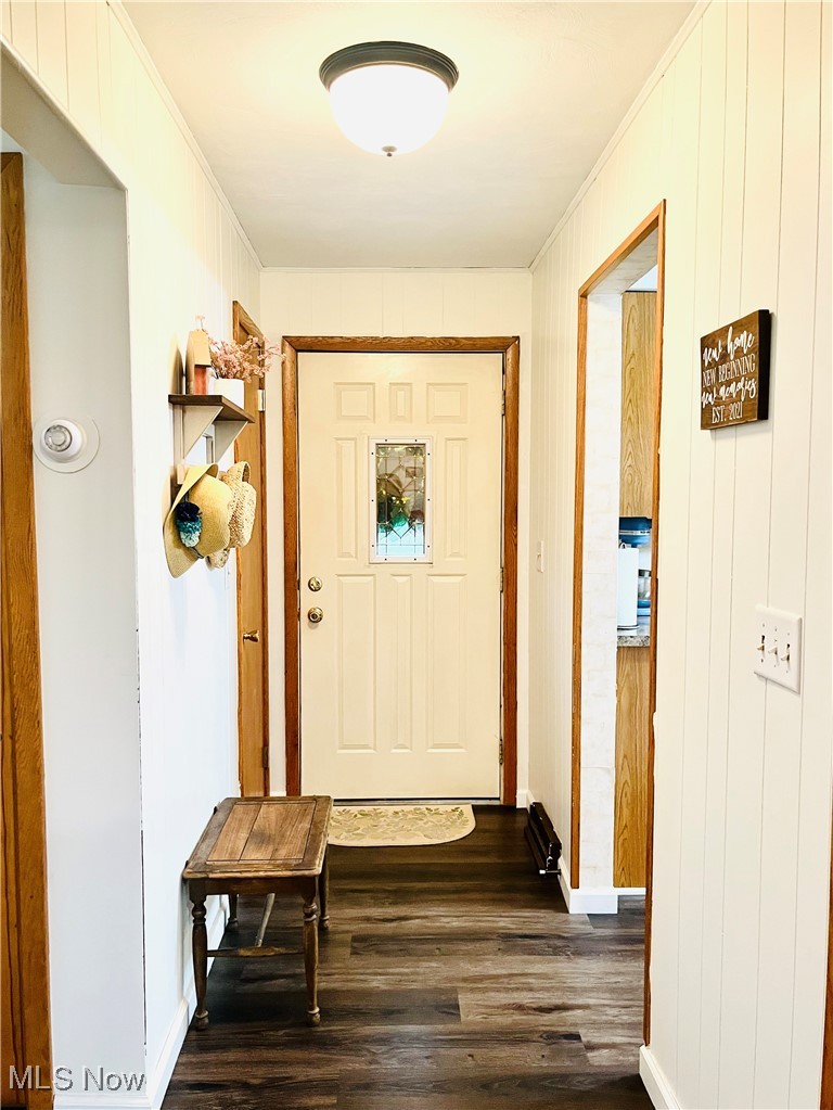 91070 Kilgore Ridge Road Scio, OH 43988 - Photo 4 of 40 Doorway to outside with dark wood-style flooring and crown molding