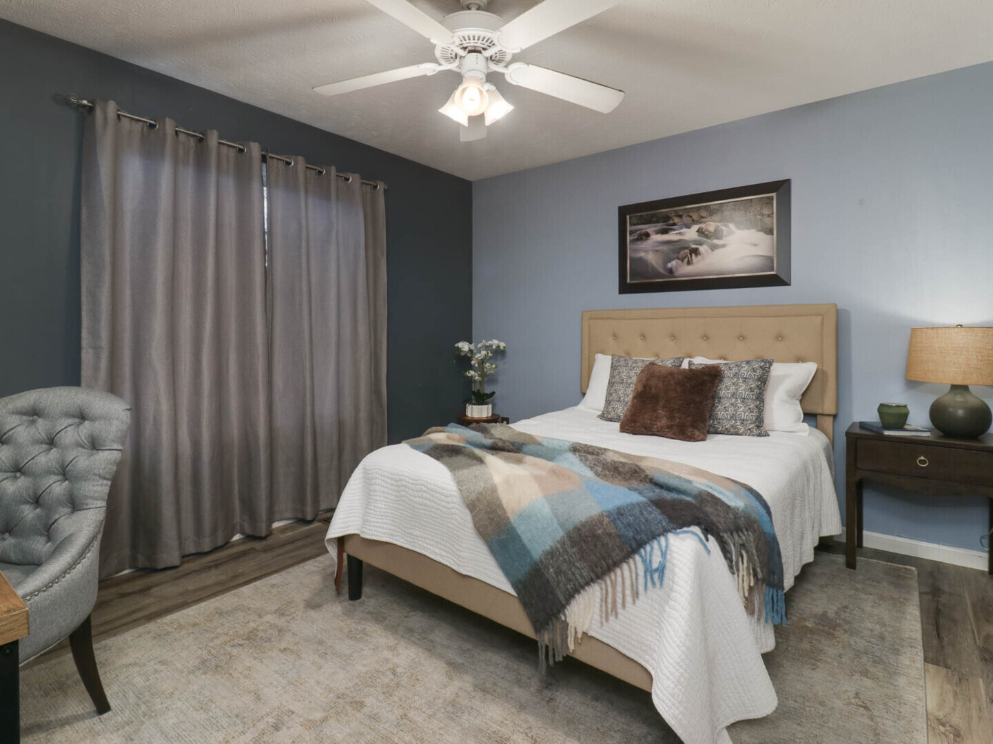 109 Sandra Court Normal, IL 61761 - Photo 11 of 35 a bedroom with a bed and a chandelier
