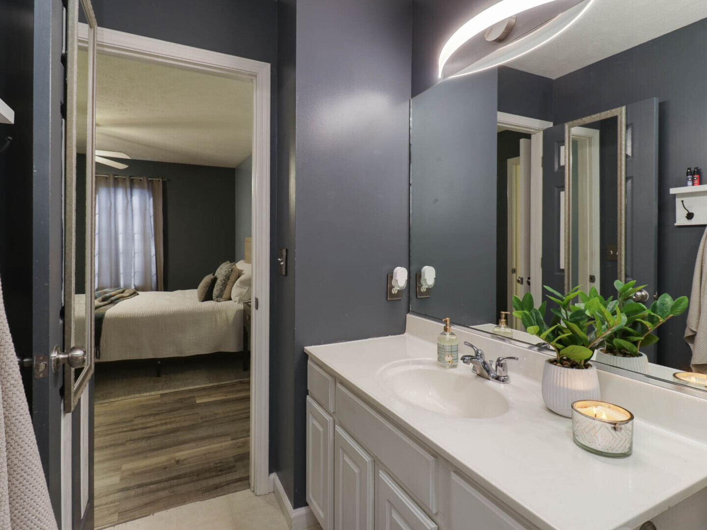109 Sandra Court Normal, IL 61761 - Photo 17 of 35 a bathroom with a sink a faucet and a mirror
