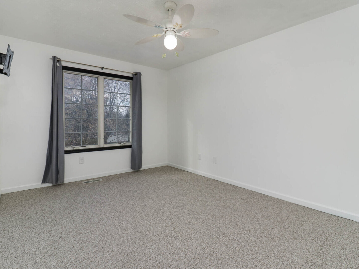 109 Sandra Court Normal, IL 61761 - Photo 21 of 35 an empty room with chandelier fan and windows