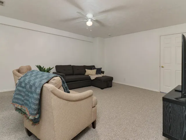 a living room with furniture and a couch
