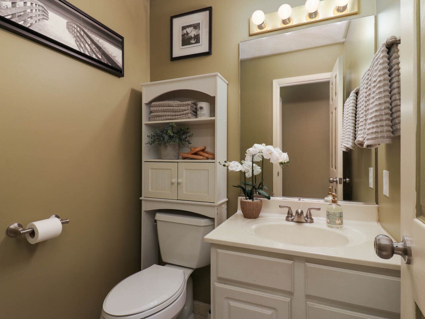 109 Sandra Court Normal, IL 61761 - Photo 10 of 35 a bathroom with a toilet a sink and mirror