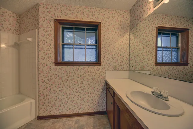 an empty room with windows