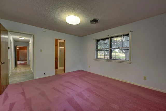 an empty room with a window