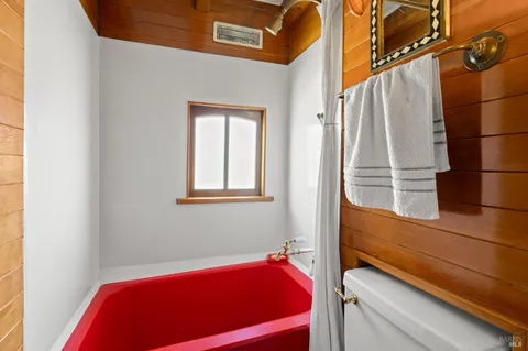 a view of a chairs and table in the patio