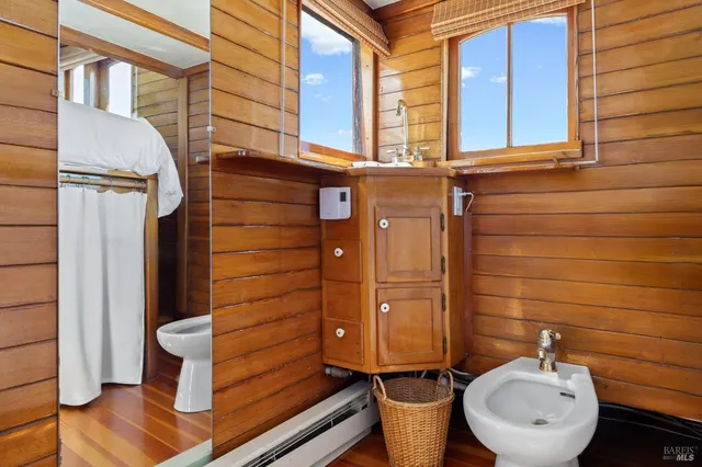 a utility room with closet dryer and washer