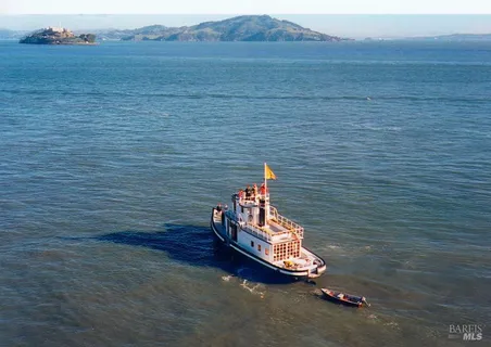 a front view of a house with wooden fence