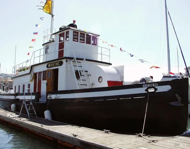 a view of a patio with couches table and chairs and potted plants