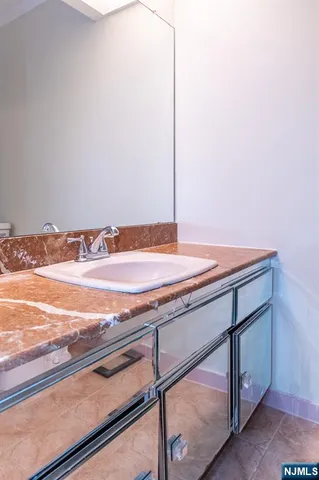 a view of a room with rack on the wall