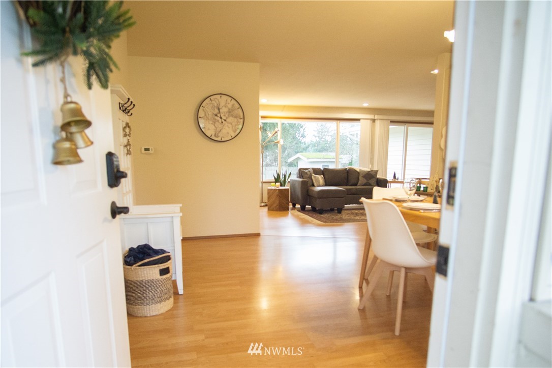 306 216th Street Southwest Bothell, WA 98021 - Photo 2 of 31 a living room with furniture and a large window