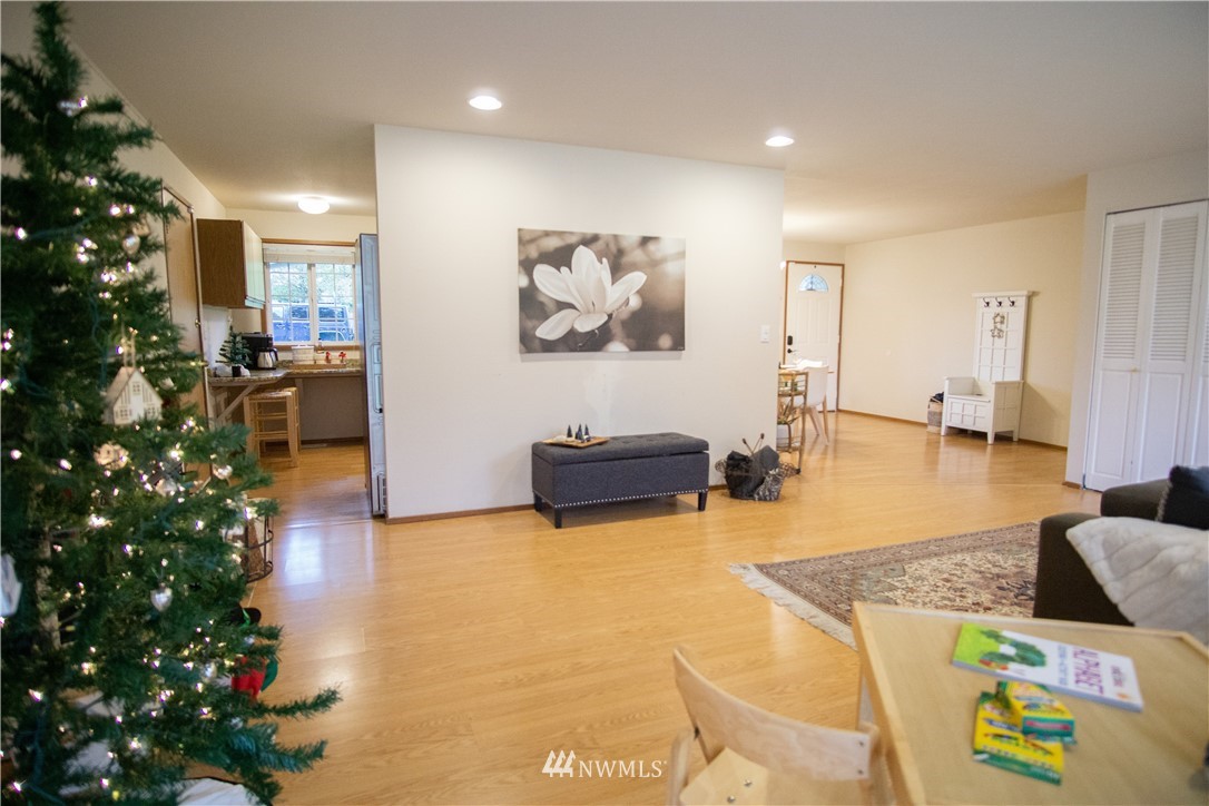 306 216th Street Southwest Bothell, WA 98021 - Photo 11 of 31 a living room with furniture and flowers