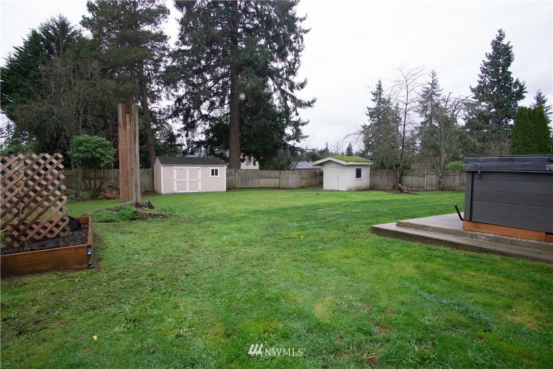 306 216th Street Southwest Bothell, WA 98021 - Photo 27 of 31 a view of a house with backyard and sitting area
