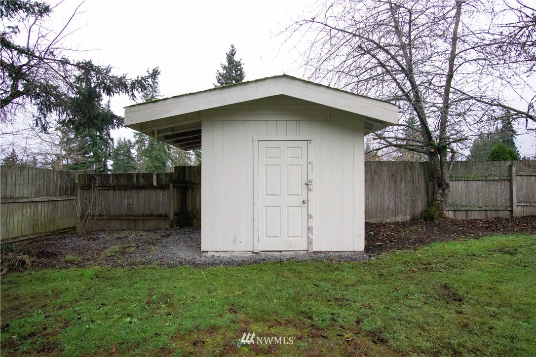 306 216th Street Southwest Bothell, WA 98021 - Photo 30 of 31 a house with trees in the background
