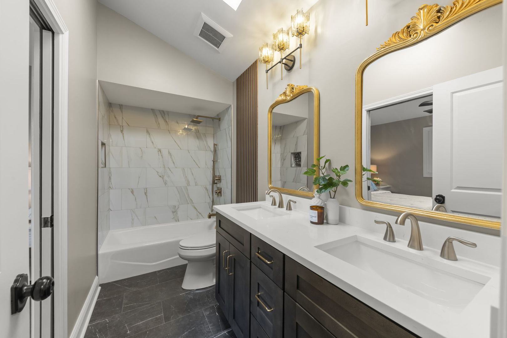 641 Highview Avenue Addison, IL 60101 - Photo 12 of 36 a bathroom with a sink a toilet and shower