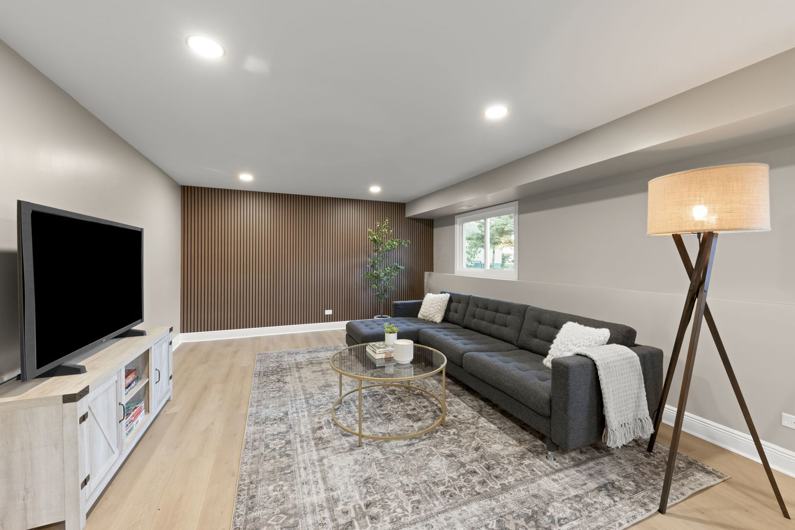 641 Highview Avenue Addison, IL 60101 - Photo 15 of 36 a living room with furniture and a flat screen tv