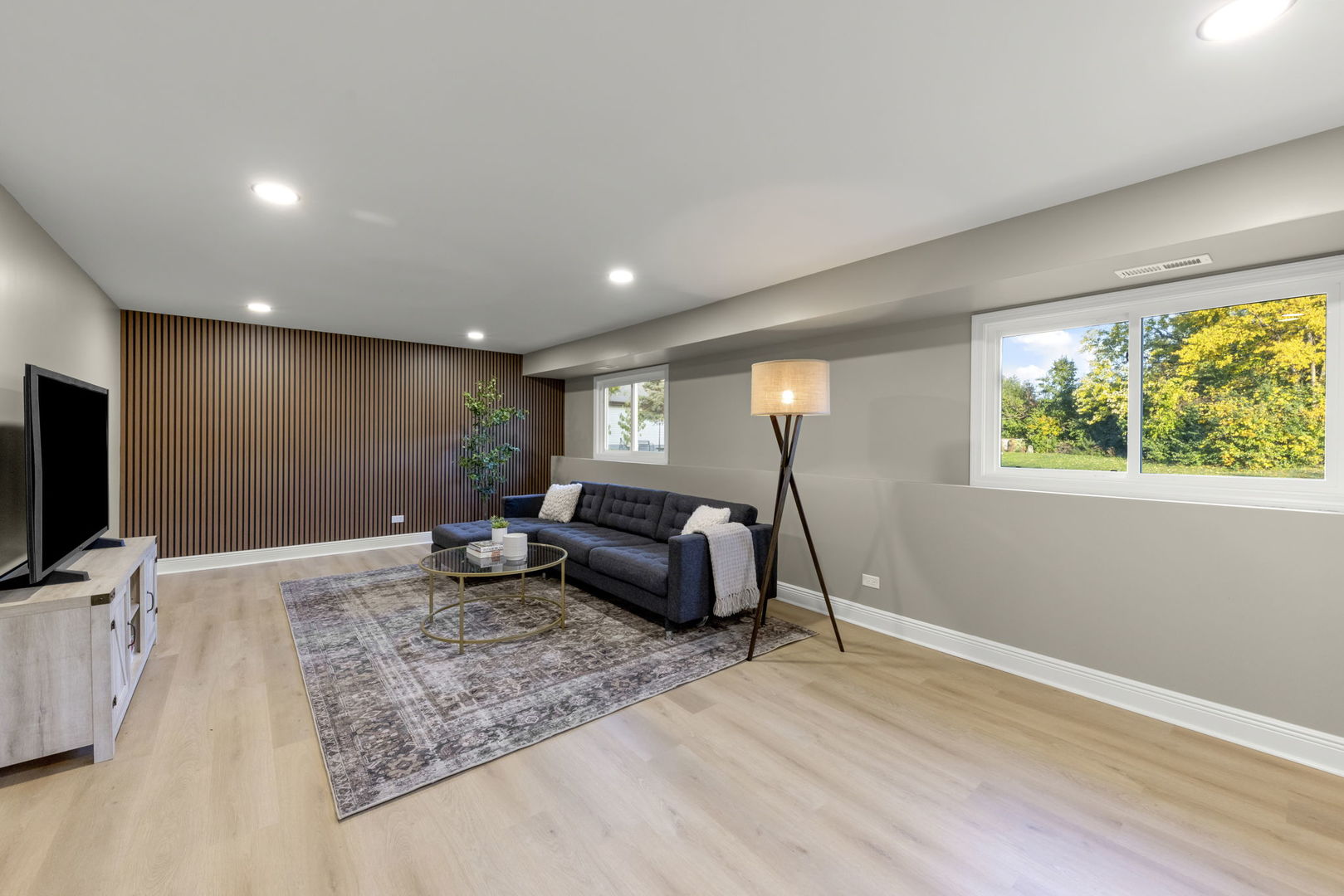 641 Highview Avenue Addison, IL 60101 - Photo 16 of 36 a living room with furniture and a flat screen tv