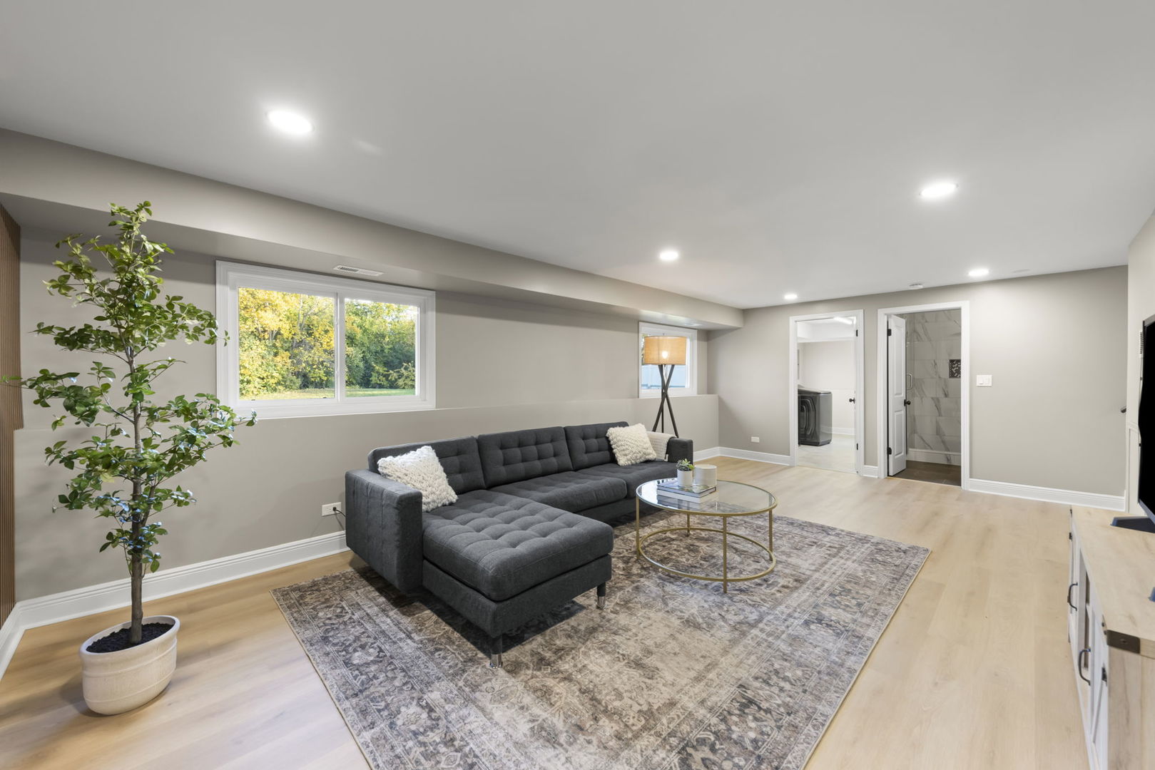 641 Highview Avenue Addison, IL 60101 - Photo 17 of 36 a living room with furniture potted plant and a window