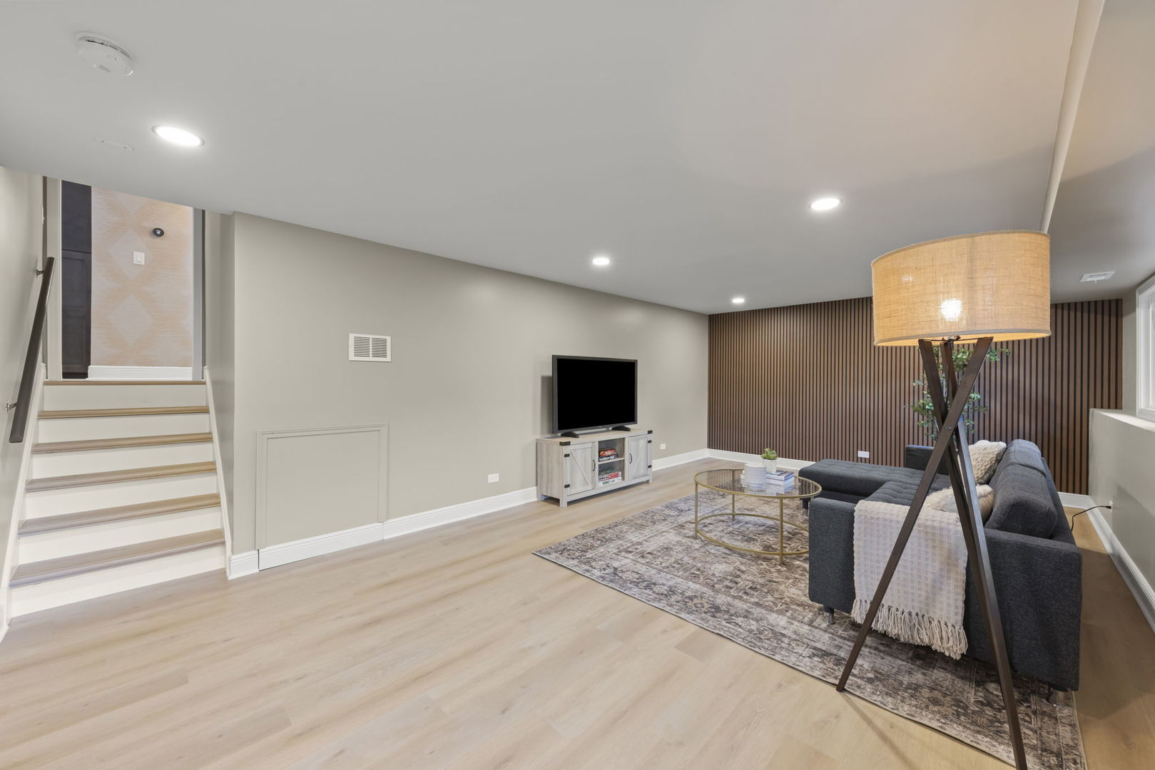 641 Highview Avenue Addison, IL 60101 - Photo 18 of 36 a bed room with a bed and a flat screen tv