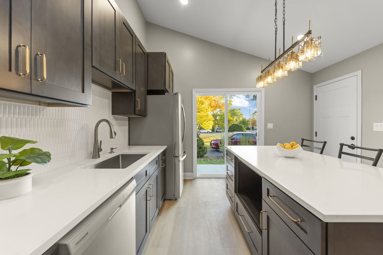 641 Highview Avenue Addison, IL 60101 - Photo 7 of 36 a kitchen with a sink and a refrigerator