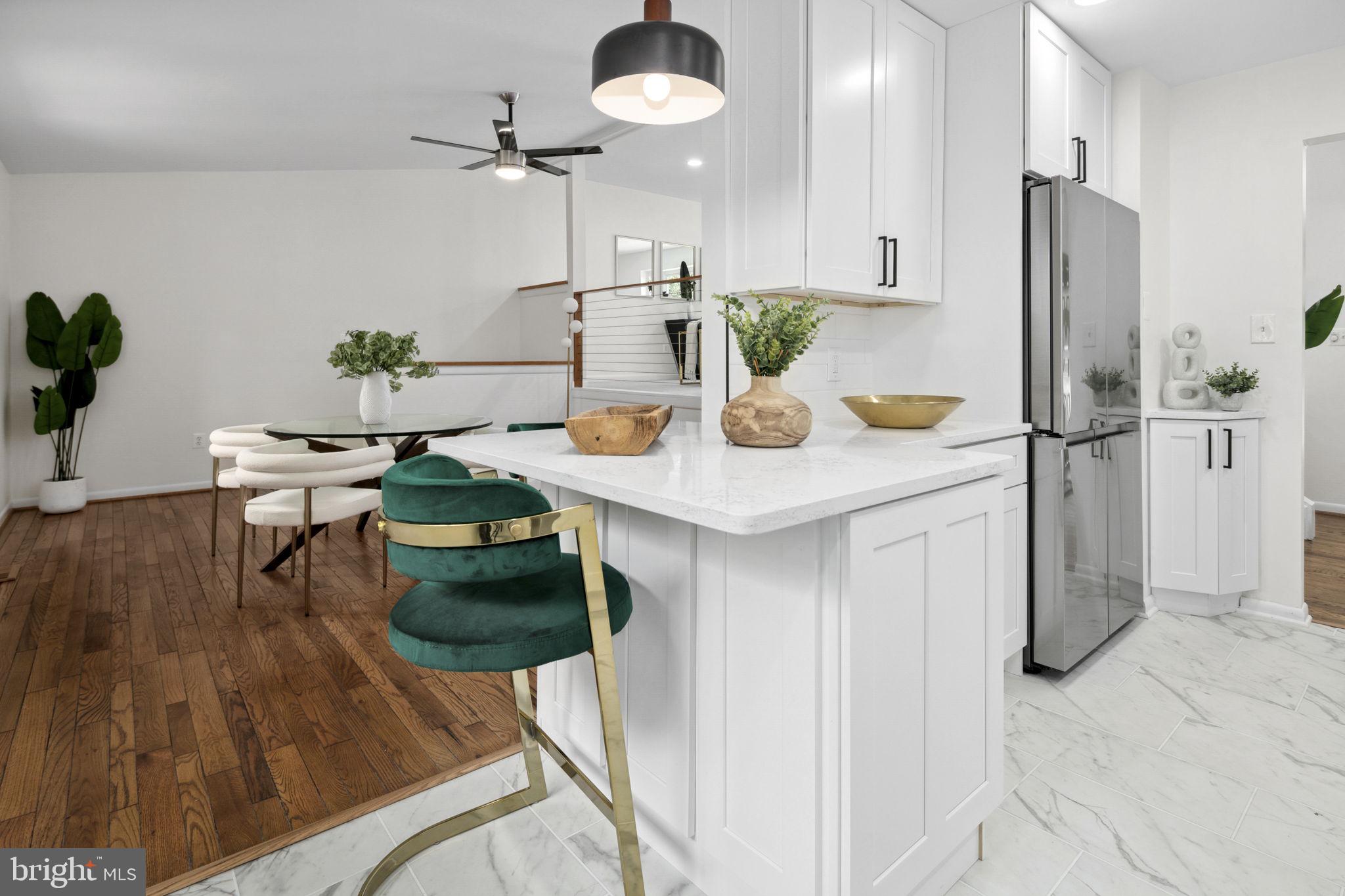 8716 Center Road Springfield, VA 22152 - Photo 16 of 53 Breakfast Bar opens to the dining room
