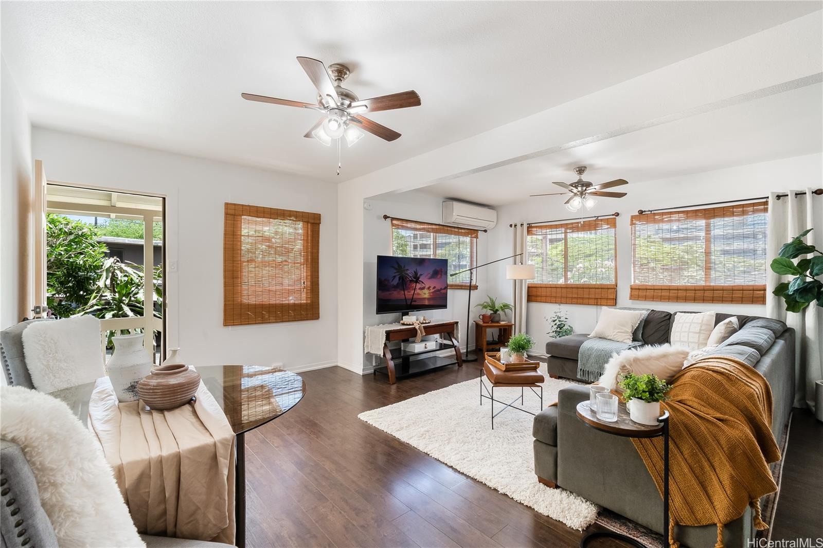 1506 Frear Street, Unit A Honolulu, HI 96813 - Photo 2 of 19 a living room with furniture and a flat screen tv