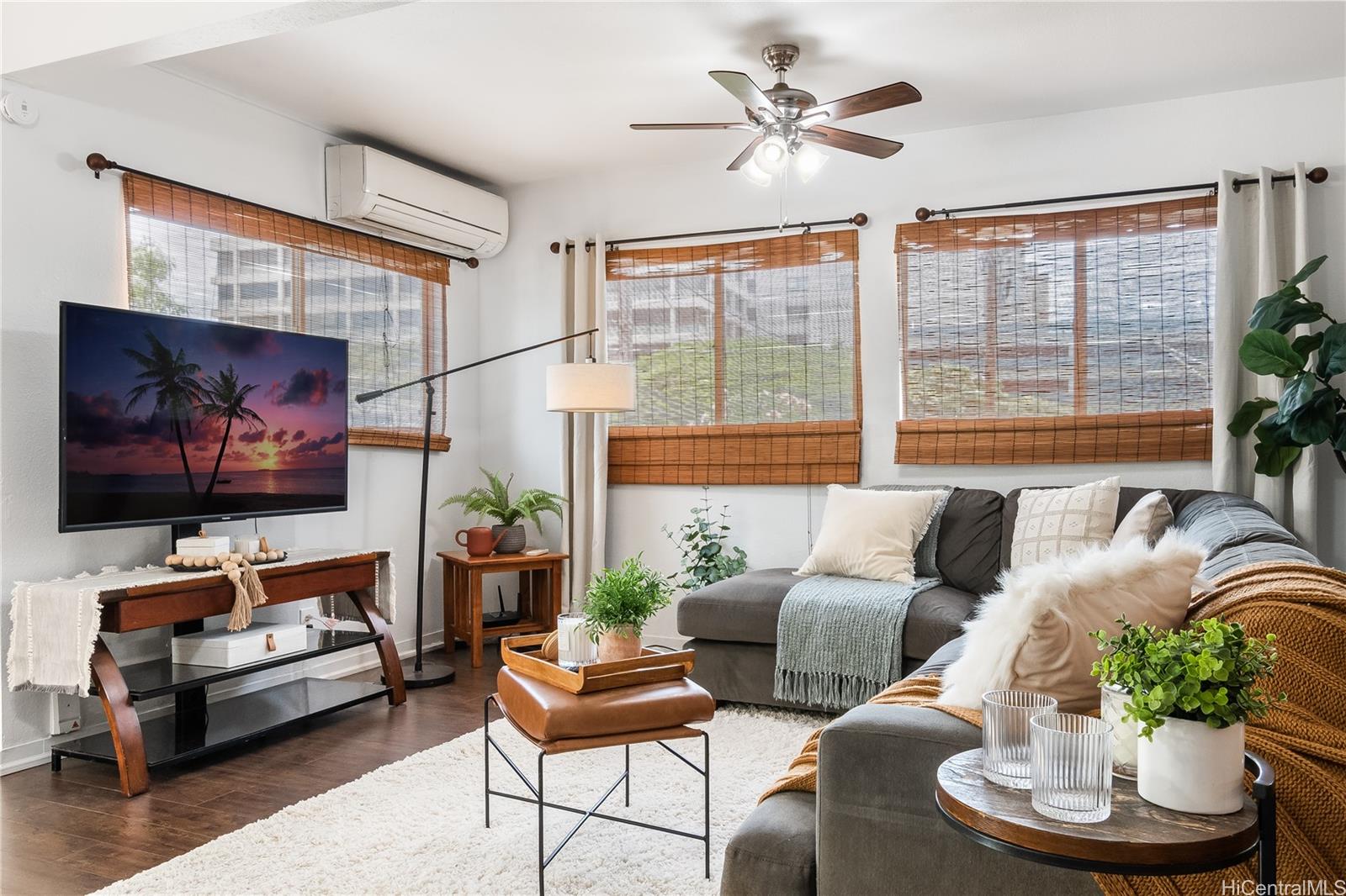 1506 Frear Street, Unit A Honolulu, HI 96813 - Photo 3 of 19 a living room with furniture a large window and a flat screen tv