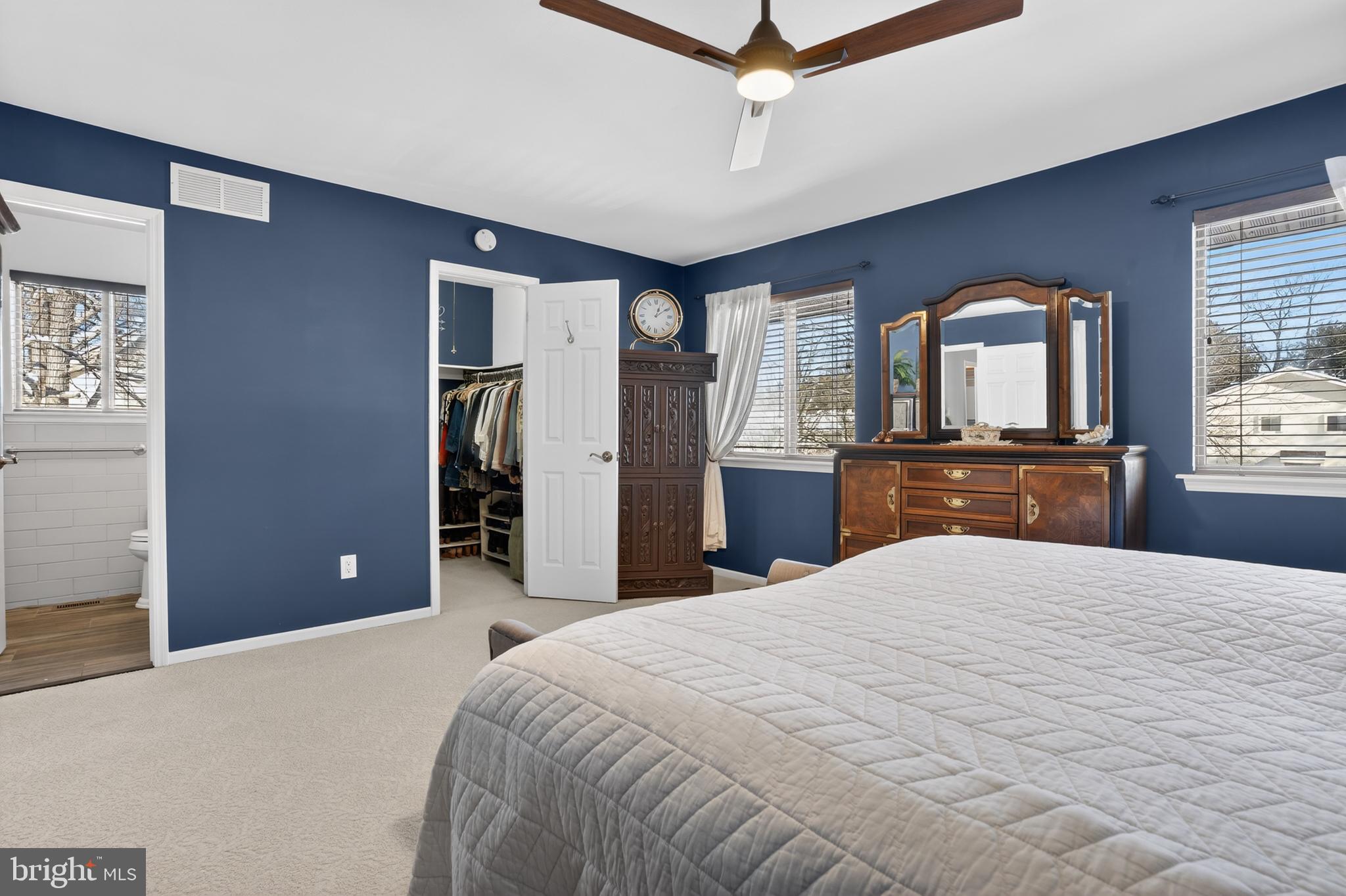 1104 Brinton Place Road, Unit 19 West Chester, PA 19380 - Photo 16 of 32 a bedroom with a large bed dresser and a window