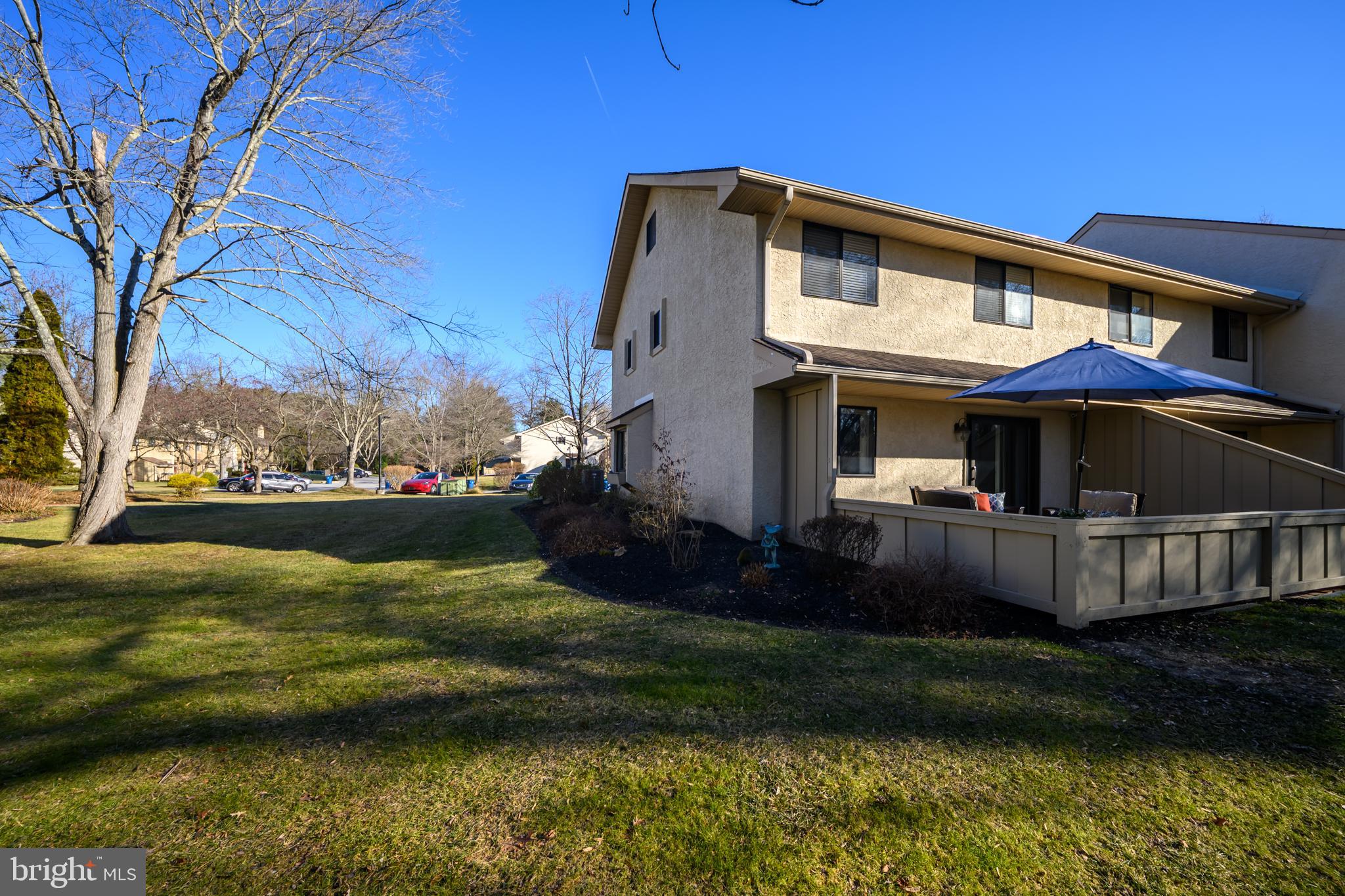 1104 Brinton Place Road, Unit 19 West Chester, PA 19380 - Photo 29 of 32 a front view of a house with a yard