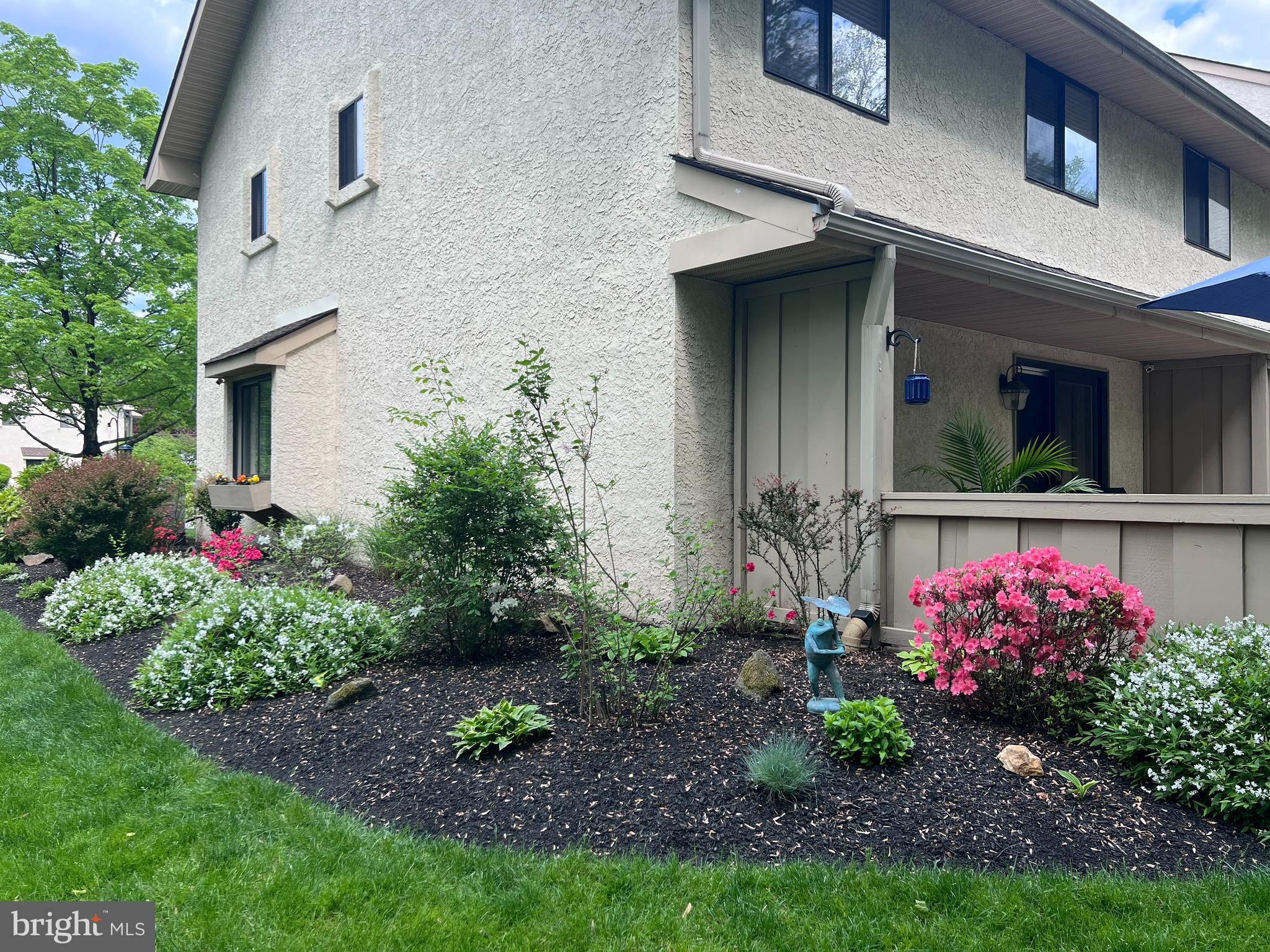 1104 Brinton Place Road, Unit 19 West Chester, PA 19380 - Photo 30 of 32 a front view of a house with a yard