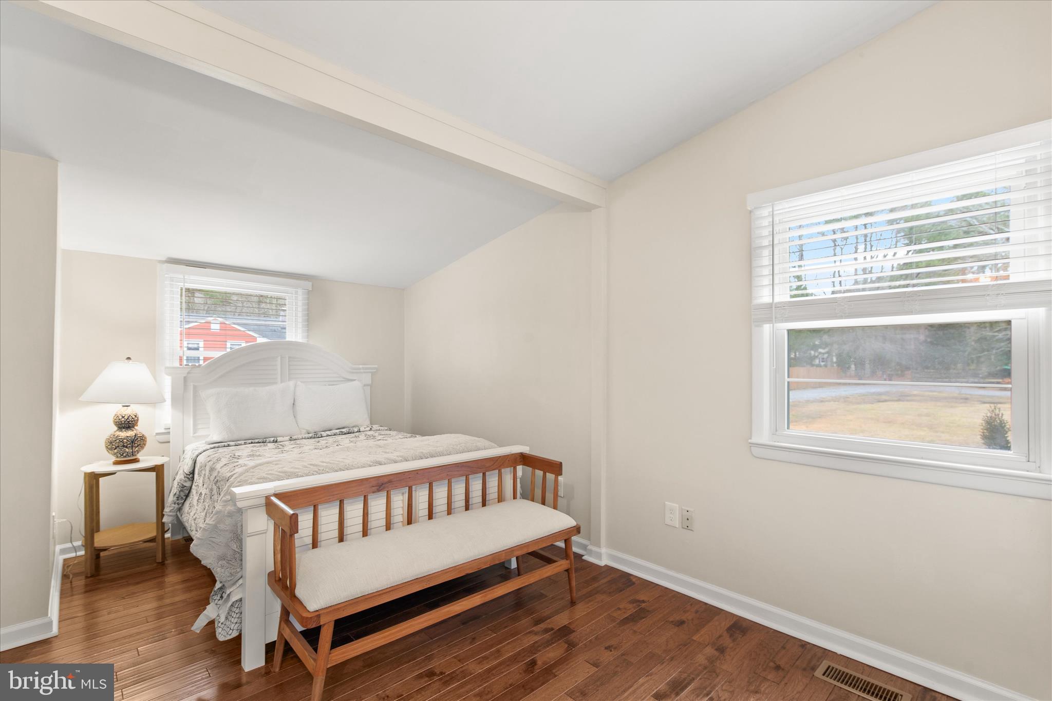 12107 Angler Road Ocean City, MD 21842 - Photo 45 of 106 a bedroom with a bed and a window