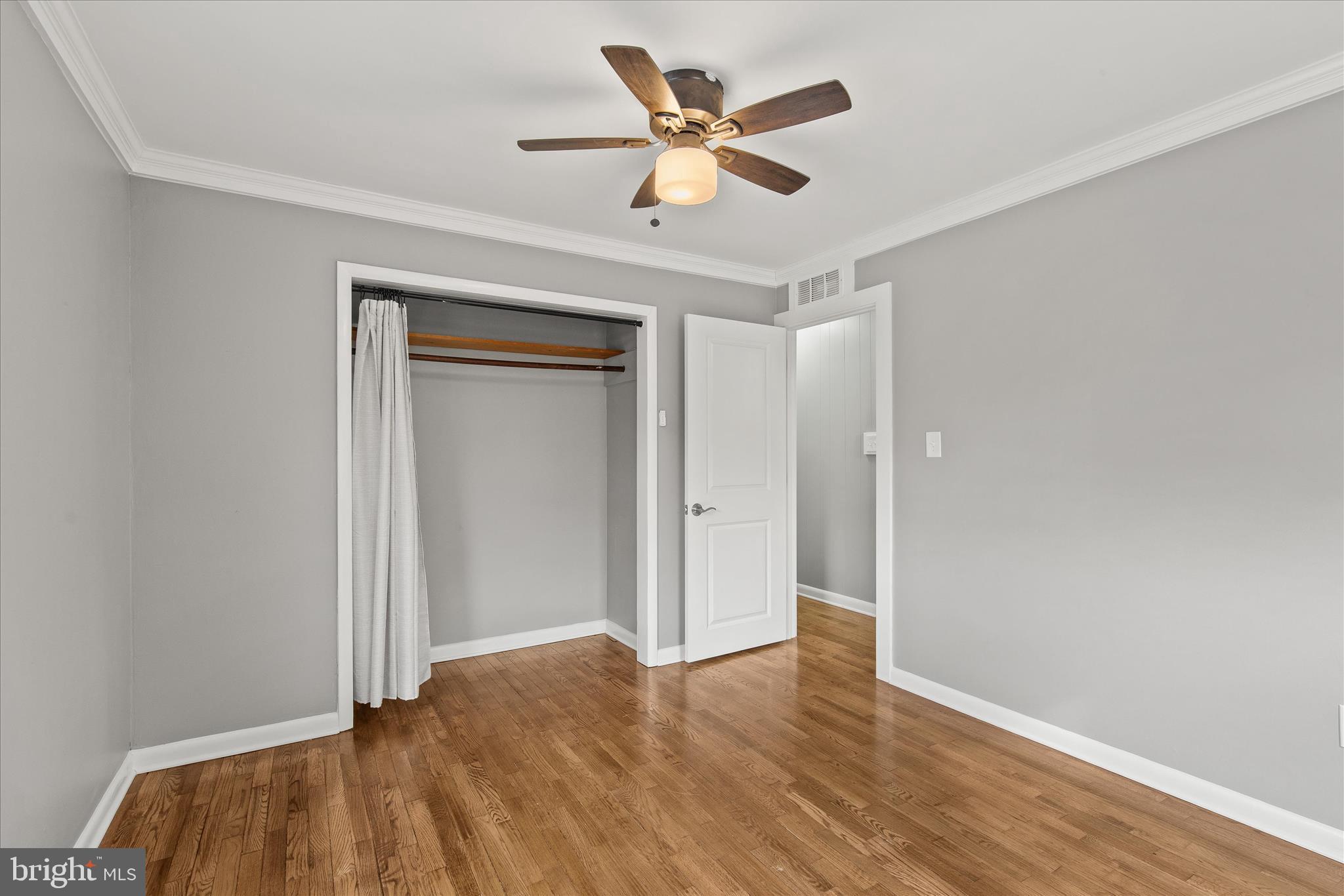 12107 Angler Road Ocean City, MD 21842 - Photo 70 of 106 a view of an empty room and wooden floor
