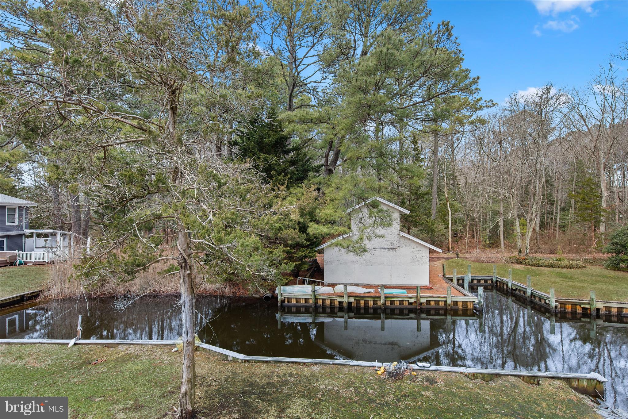 12107 Angler Road Ocean City, MD 21842 - Photo 80 of 106 a view of a house with a yard and sitting area