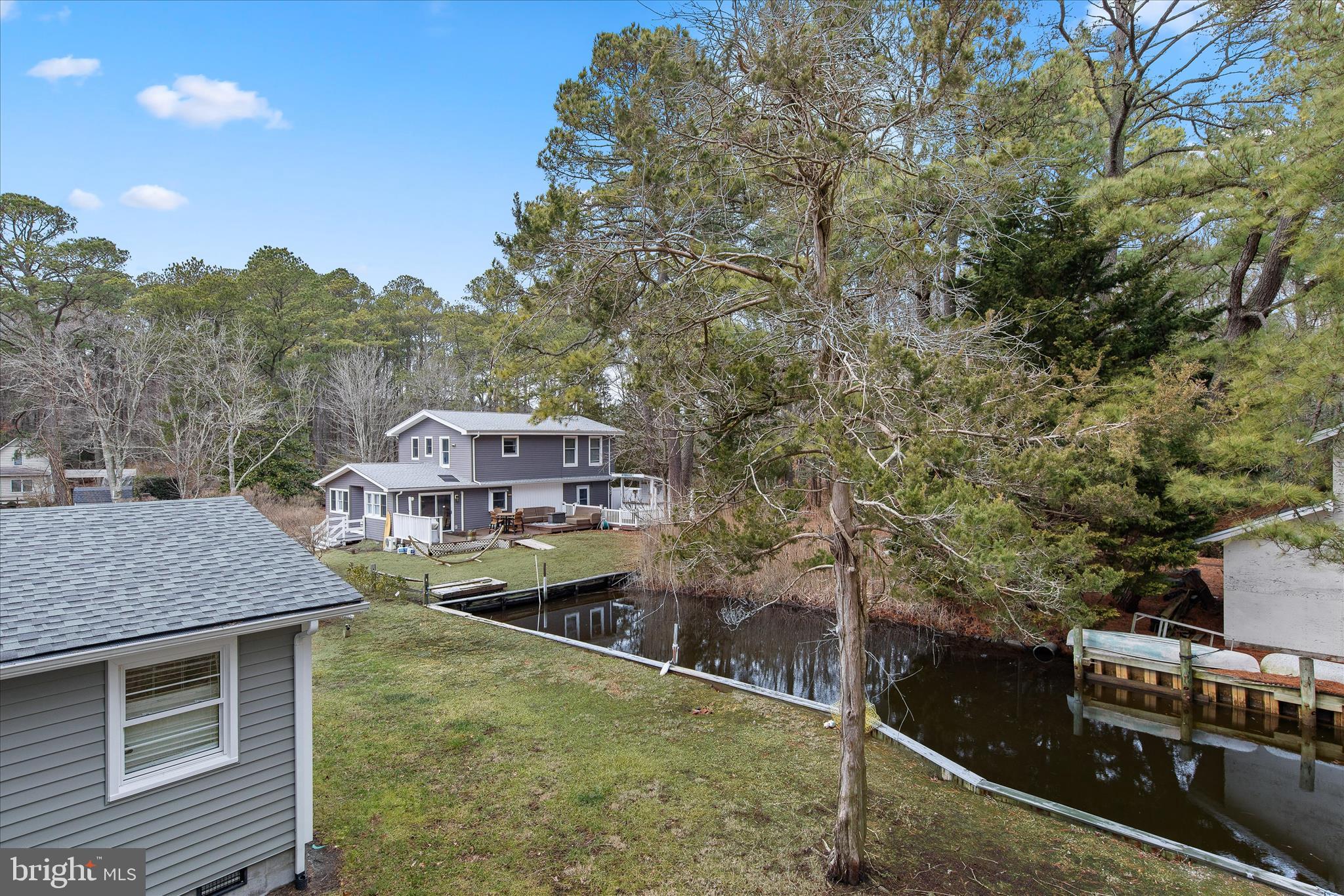 12107 Angler Road Ocean City, MD 21842 - Photo 81 of 106 a aerial view of a house with a yard