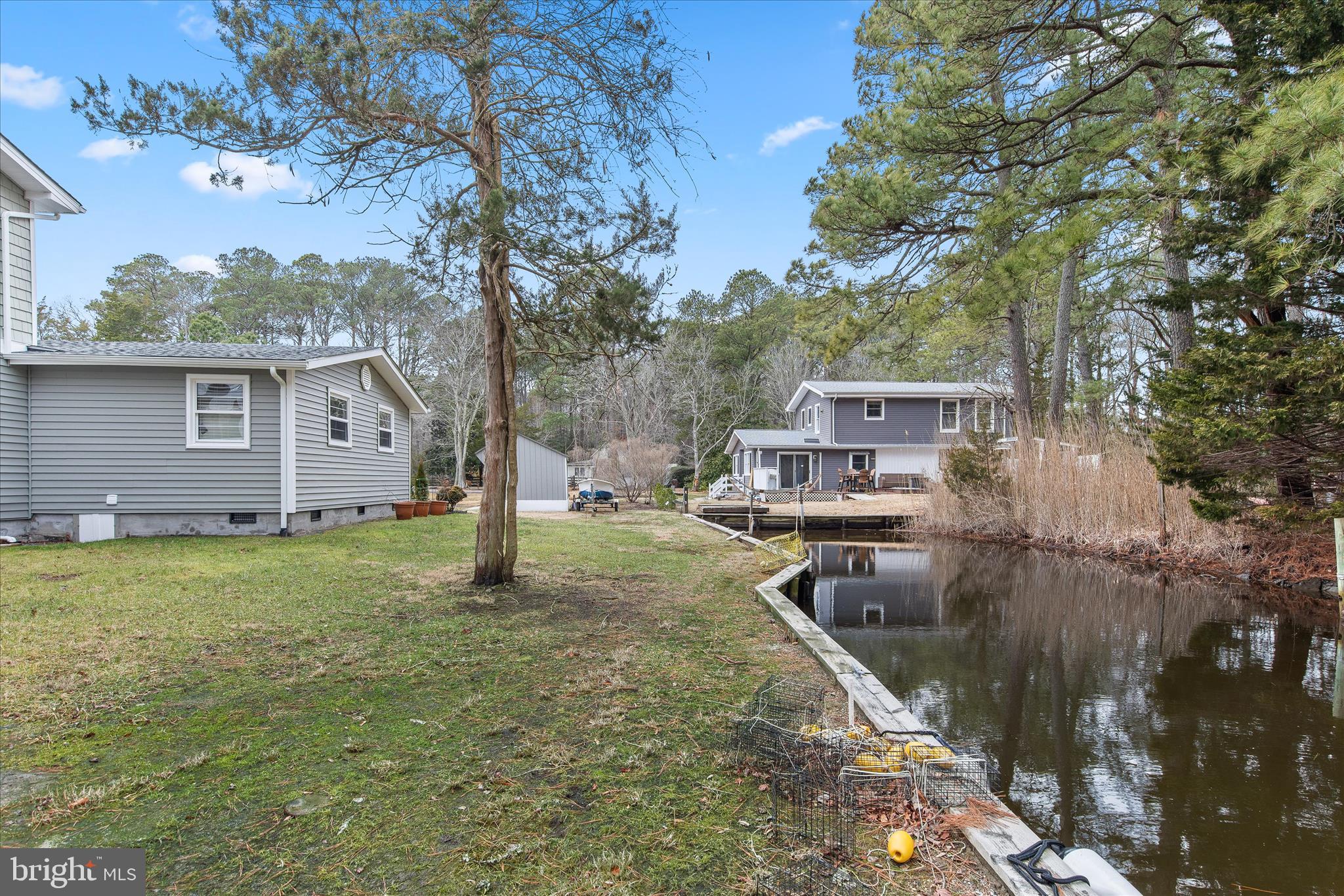 12107 Angler Road Ocean City, MD 21842 - Photo 95 of 106 a backyard of a house with lots of green space