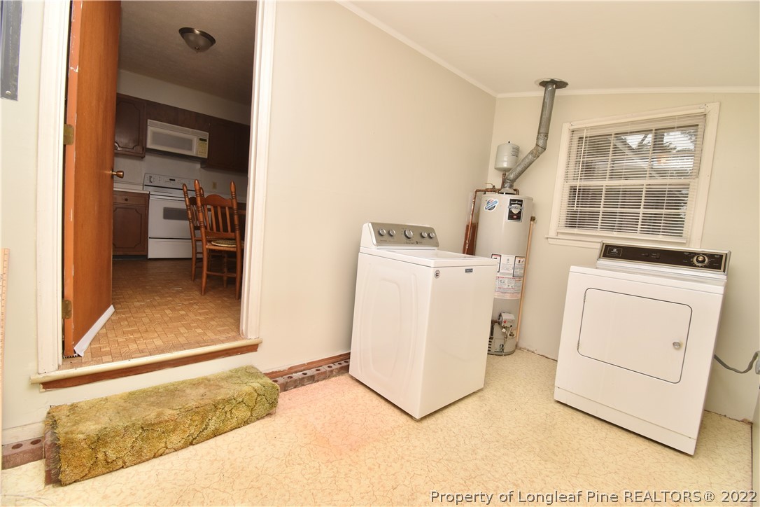 5401 Chesapeake Road Fayetteville, NC 28311 - Photo 14 of 17 a utility room with dryer and washer