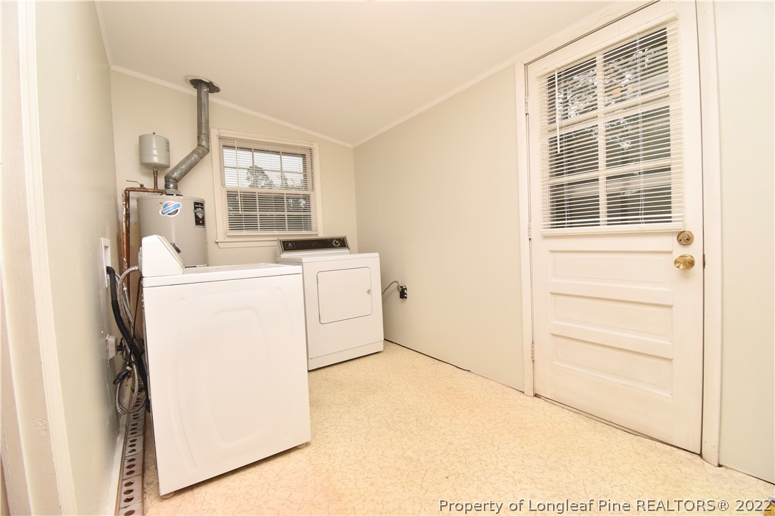 5401 Chesapeake Road Fayetteville, NC 28311 - Photo 15 of 17 a utility room with dryer and washer