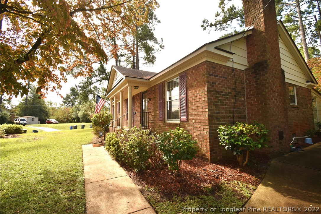 5401 Chesapeake Road Fayetteville, NC 28311 - Photo 2 of 17 a view of a house with a yard