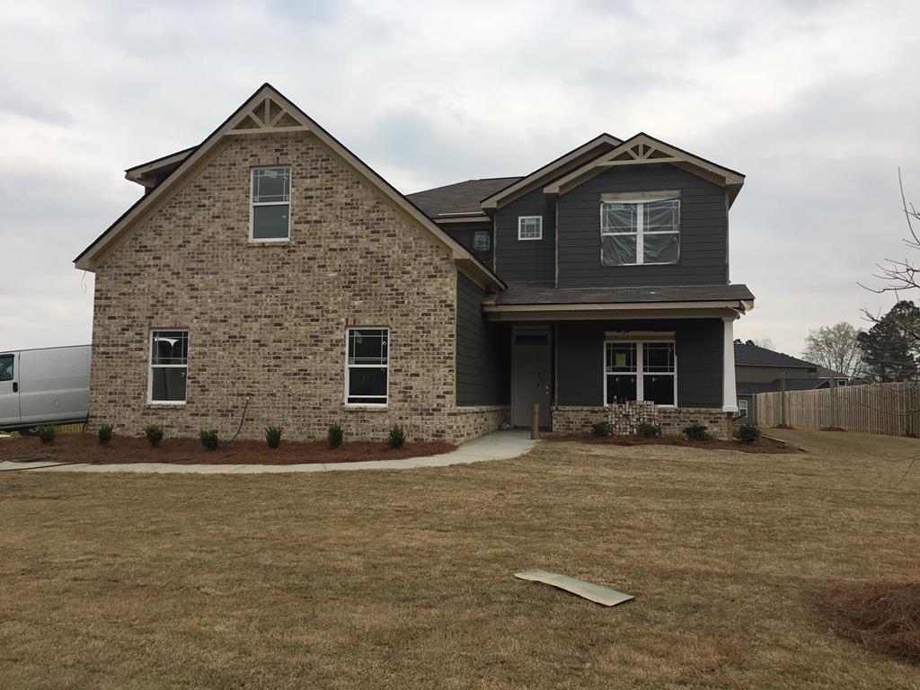 7580 Garrett Road Midland, GA 31820 - Photo 1 of 1 a front view of a house with a yard