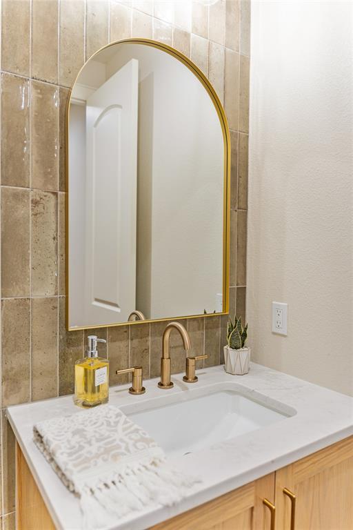 152 North Big Red Way China Spring, TX 76633 - Photo 10 of 31 a bathroom with a granite countertop sink and a mirror