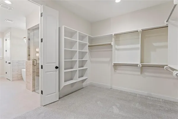 a bathroom with a double vanity sink and mirror
