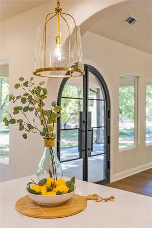 a kitchen with a refrigerator and a sink
