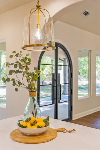 a kitchen with a refrigerator and a sink