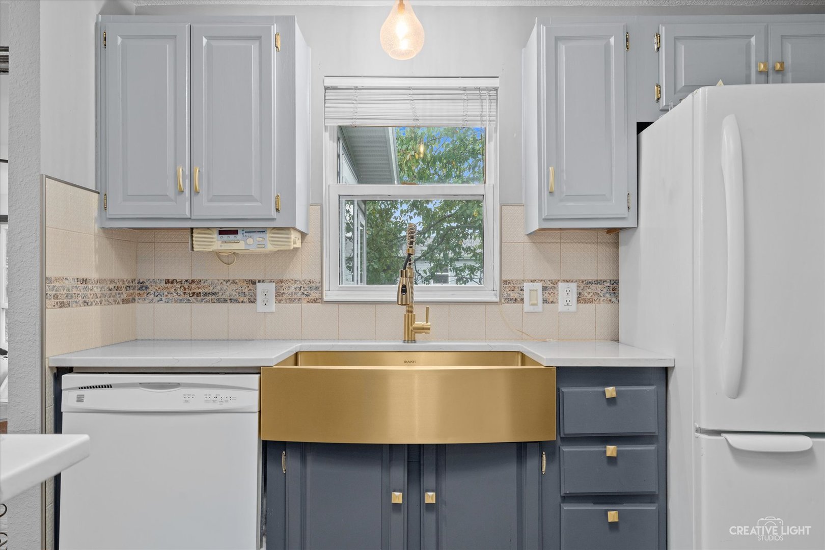 125 Cardinal Lane Sandwich, IL 60548 - Photo 14 of 21 a kitchen with a refrigerator and a sink