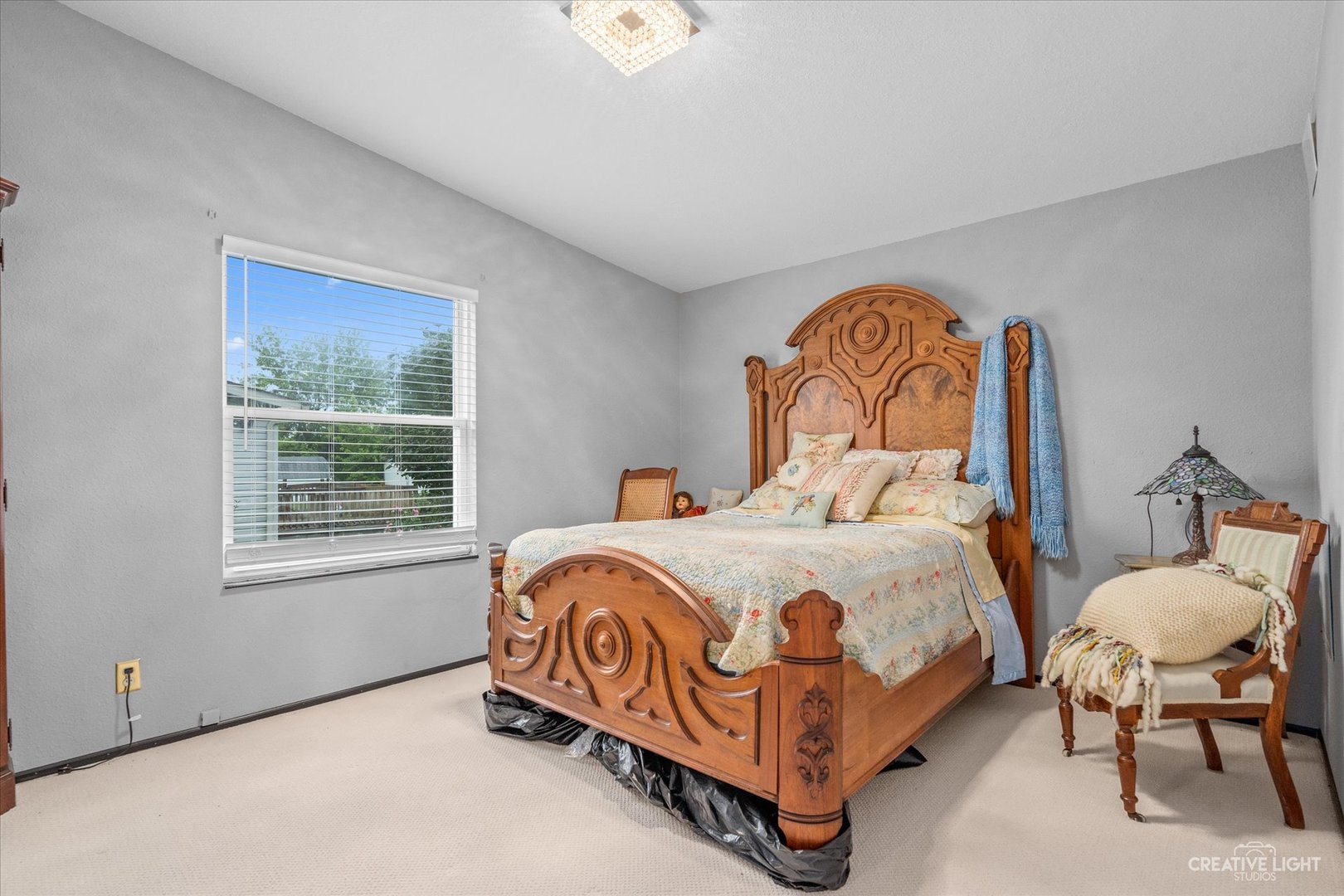 125 Cardinal Lane Sandwich, IL 60548 - Photo 17 of 21 a bedroom with a bed and a window