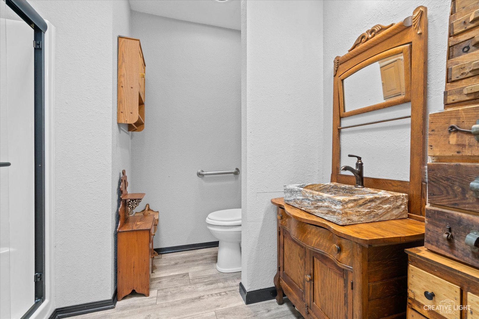 125 Cardinal Lane Sandwich, IL 60548 - Photo 20 of 21 a view of bathroom with a sink and a toilet