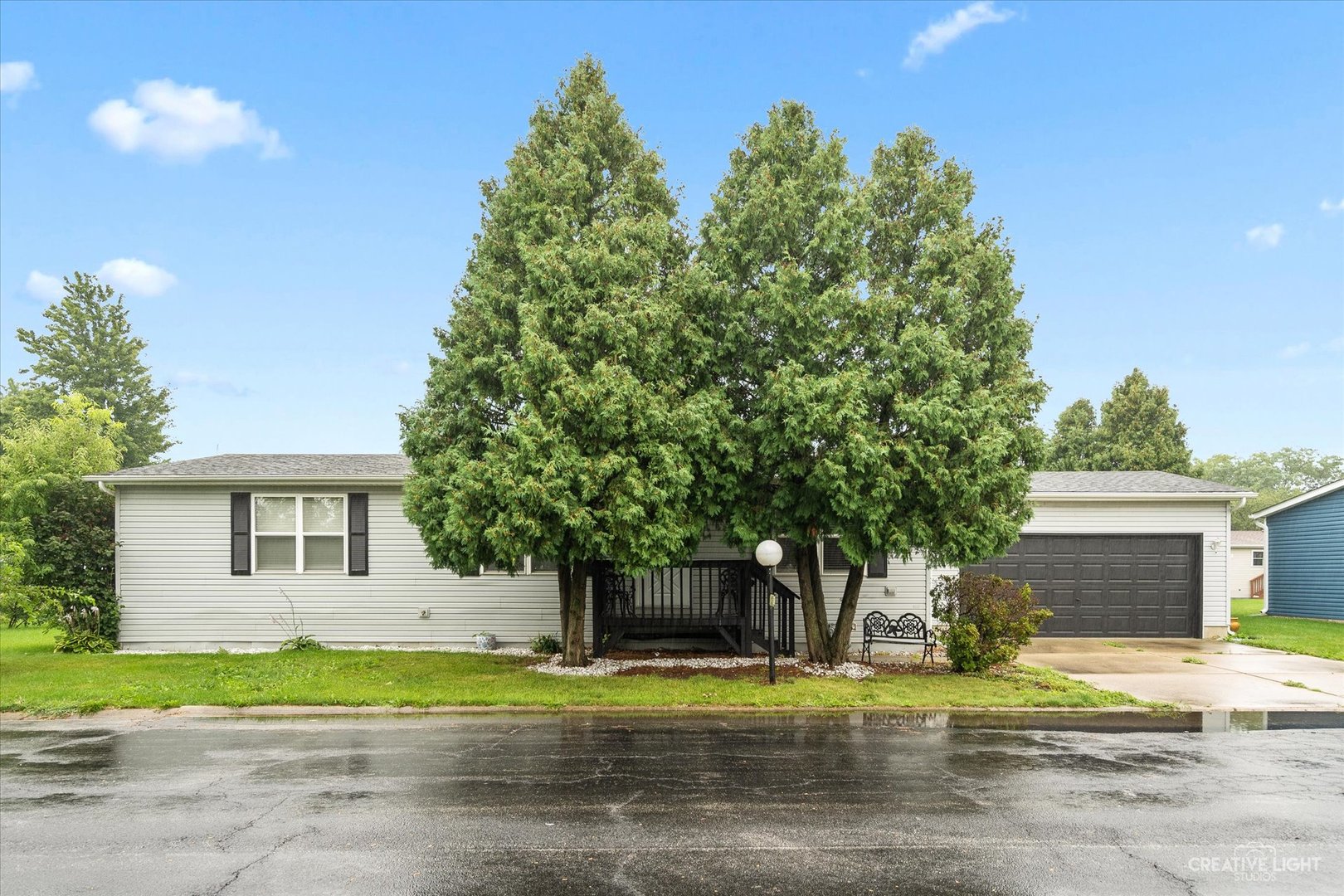 125 Cardinal Lane Sandwich, IL 60548 - Photo 2 of 21 a front view of a house with a yard